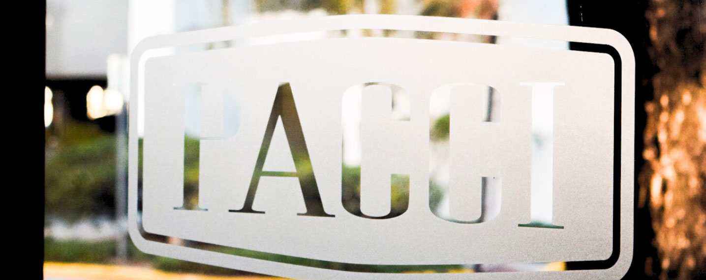 Close up of Pacci logo on glass doors